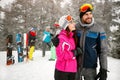 Couple snowboarder enjoying at ski resort in the mountain with f Royalty Free Stock Photo