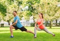 Smiling couple stretching outdoors Royalty Free Stock Photo