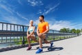 Smiling couple stretching outdoors Royalty Free Stock Photo