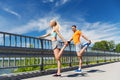 Smiling couple stretching outdoors Royalty Free Stock Photo