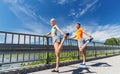 Smiling couple stretching outdoors Royalty Free Stock Photo