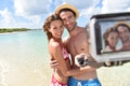 Smiling couple taking selfie on the beach Royalty Free Stock Photo