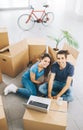 Smiling couple in their new house