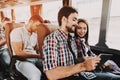 Smiling Couple Using Digital Tablet in Tour Bus Royalty Free Stock Photo