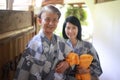 A smiling couple in a yukata