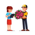 Courier man handing bouquet of flowers to woman
