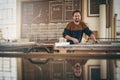 Smiling craftsman at work in his woodwork studio Royalty Free Stock Photo