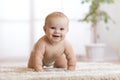 Crawling baby boy at home on floor Royalty Free Stock Photo