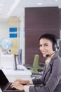 Smiling customer service lady with headset