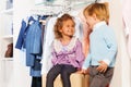 Smiling cute boy looks at girl while shopping Royalty Free Stock Photo