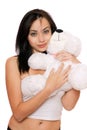 Smiling cute girl with a teddybear Royalty Free Stock Photo