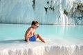 Smiling cute little boy relaxing in hot spring outdoor pool. Child in sunglasses in pool in sunny day. Kid in luxery Royalty Free Stock Photo