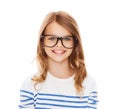 Smiling cute little girl with black eyeglasses Royalty Free Stock Photo