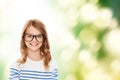 Smiling cute little girl with black eyeglasses Royalty Free Stock Photo