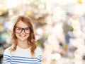 Smiling cute little girl with black eyeglasses Royalty Free Stock Photo