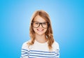 Smiling cute little girl with black eyeglasses