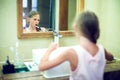 Smiling cute little girl brushing teeth in bathroom. Hygiene con Royalty Free Stock Photo