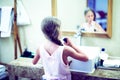 Smiling cute little girl brushing teeth in bathroom. Hygiene con Royalty Free Stock Photo