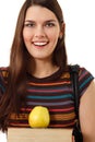 Smiling cute teen student girl with book and apple Royalty Free Stock Photo