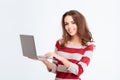 Smiling cute woman using laptop computer Royalty Free Stock Photo