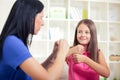 Smiling deaf girl learning sign language