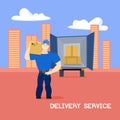 Smiling delivery guy holding a box in front of a truck