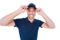 Smiling delivery man wearing cap on white background Royalty Free Stock Photo