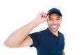 Smiling delivery man wearing cap on white background