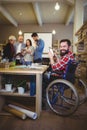 Smiling disabled businessman using digital tablet Royalty Free Stock Photo