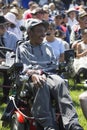 Smiling disabled veteran in wheel chair at Los Angeles National Cemetery Annual Memorial Event, May 26, 2014, California, USA