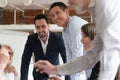 Smiling diverse colleagues brainstorm at office meeting Royalty Free Stock Photo