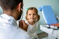 Doctor examines a child with stethoscope in examination room. Healthcare people children concept Royalty Free Stock Photo