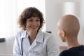 Smiling doctor feel excited with cancer patient good results