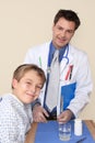 Smiling Doctor and happy patient Royalty Free Stock Photo