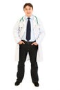 Smiling doctor keeping his hands in pockets Royalty Free Stock Photo