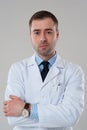 Smiling doctor male with crossed arms Royalty Free Stock Photo