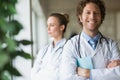 Smiling doctor standing arms crossed Royalty Free Stock Photo