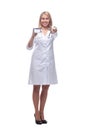 smiling doctor with a stethoscope showing her visiting card . Royalty Free Stock Photo