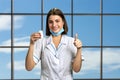 Smiling doctor with white bottle of pills. Royalty Free Stock Photo