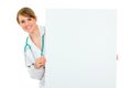 Smiling doctor woman holding billboard Royalty Free Stock Photo