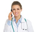 Smiling doctor woman talking mobile phone Royalty Free Stock Photo