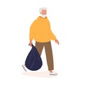 Smiling elderly Man carries black plastic trash bag full of garbage. Senior man with beard with gray hair wearing casual