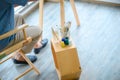 Smiling elderly man painting a vacation at home Painting equipment. Royalty Free Stock Photo