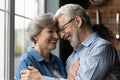 Happy mature man and woman hug showing love and care Royalty Free Stock Photo