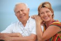 Smiling elderly married couple on veranda Royalty Free Stock Photo