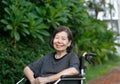 smiling elderly woman on wheelchair Royalty Free Stock Photo