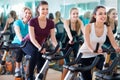 Smiling elderly and young women working out hard Royalty Free Stock Photo