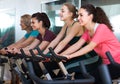 Elderly and young women working out hard in sport club Royalty Free Stock Photo