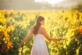 Smiling elegant woman in nature.Joy and happiness.Serene female in wine grape field in sunset.Wine growing field.Agricultural tour Royalty Free Stock Photo