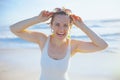 smiling elegant woman in swimwear at beach having fun time Royalty Free Stock Photo